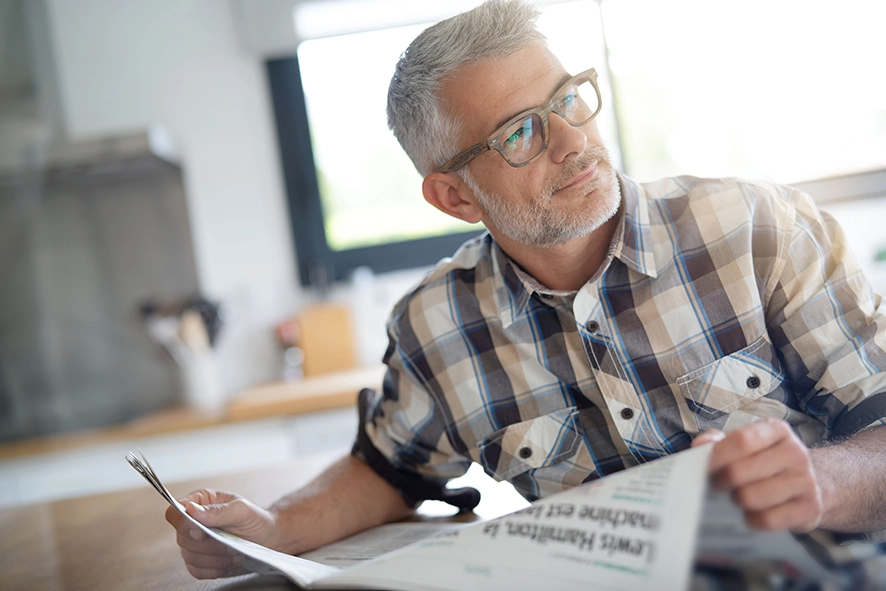 man reading the newspaper