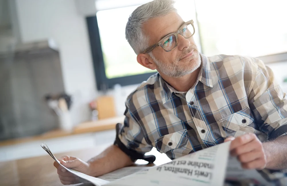 man reading the newspaper
